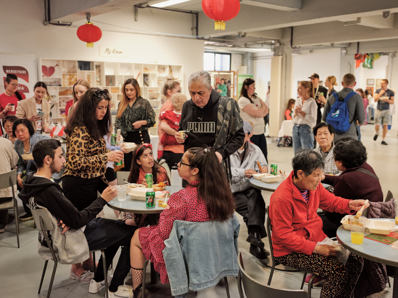 Families eating good food at the Good Food; Our Food exhibition 